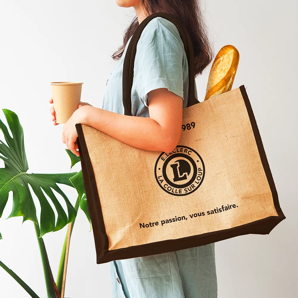 woman holding jute bag
